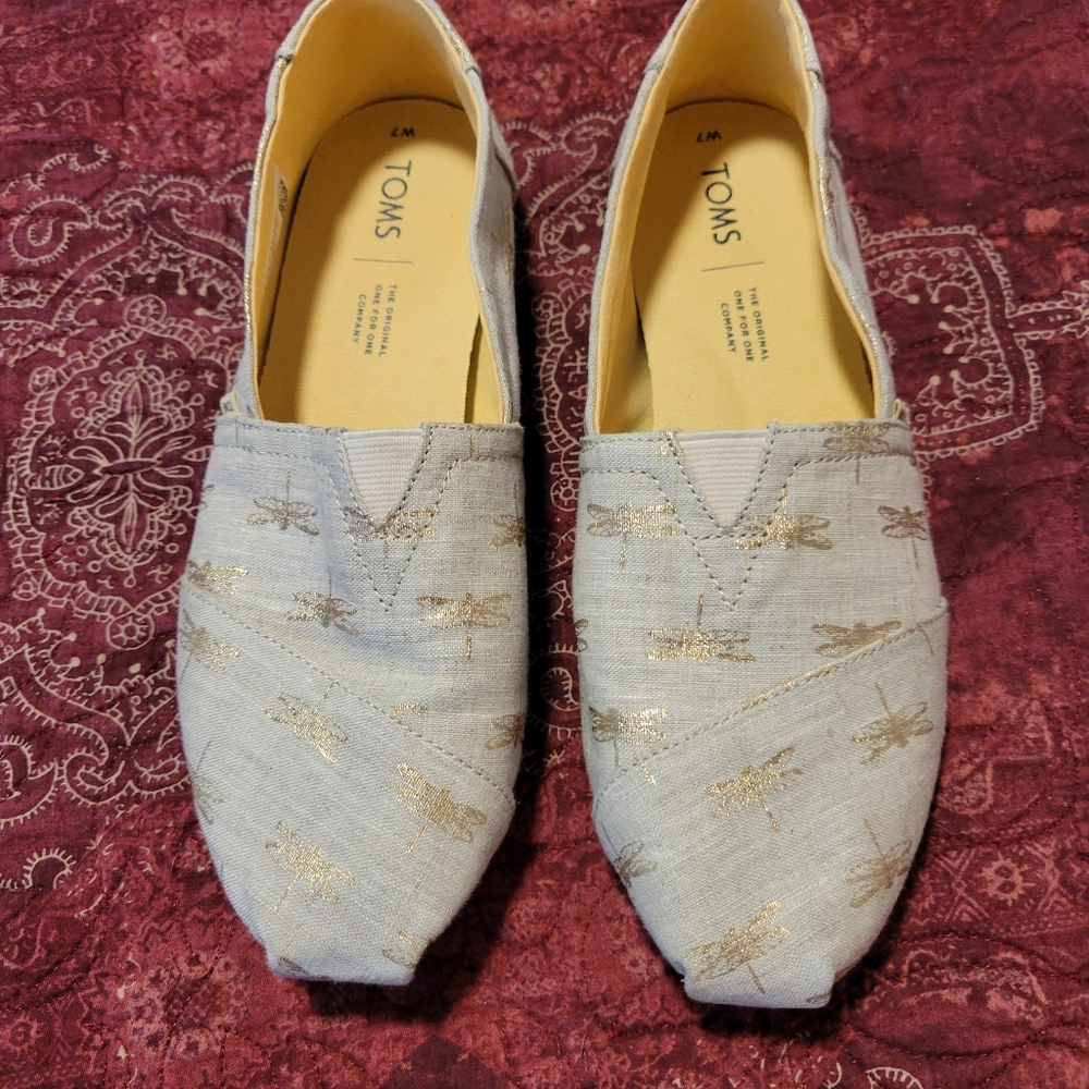 TOM'S, size 7, gold dragonfly print women's canvas slip ons.